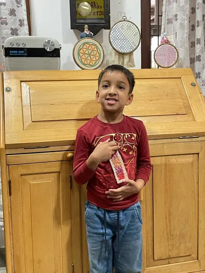 My youngest grandson proudly showing off the bookmark he made. He called it his "art," a beautiful reminder that creativity has no age limit.