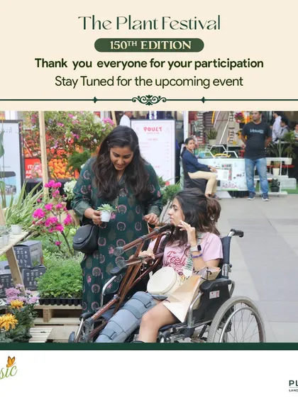 We are committed to making our events accessible and enjoyable for everyone. Here, a visitor explores our succulent collection at the 150th Plant Festival.