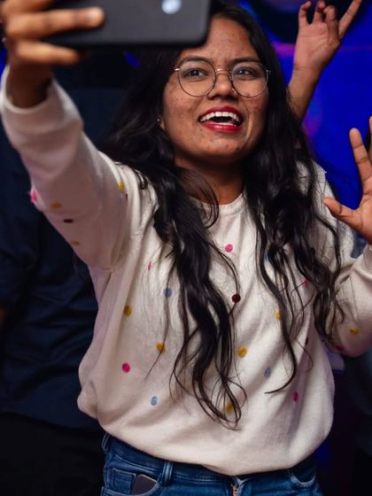 Capturing the moment with a selfie. A happy crowd is the best reward for a DJ.