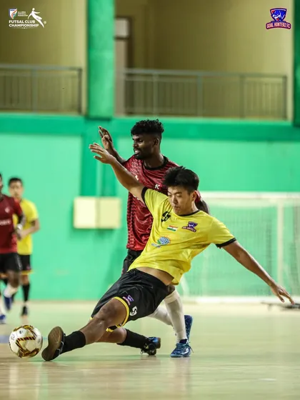 A sliding tackle to win the ball back.