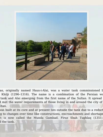 A group looks out over the Hauz Khas, or 'Royal Tank', originally built by Alauddin Khalji to supply water to his capital city of Siri.