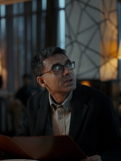 A diner looking confused by a menu, another metaphor used in the Dezerv ad. I styled him in a smart-casual blazer and shirt.