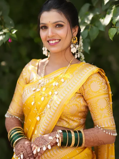 The pure joy of a Haldi ceremony. I created a fresh, dewy makeup look for this bride, keeping it light and radiant to match her yellow saree and beautiful shell and pearl jewellery.
