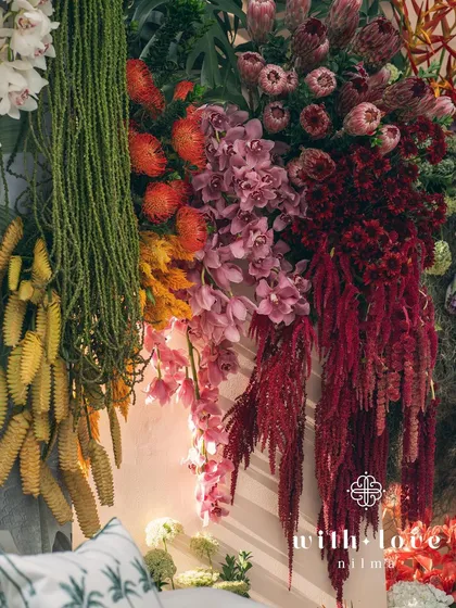 A close-up of the cascading florals from the 'Garden of Gaia' wall, showcasing the beautiful color palette.