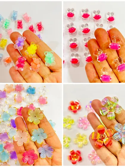 A closer look at our cute decorative add-ons. This set includes colorful teddy bears, bunnies, and flowers, perfect for creating charming and playful resin pieces.