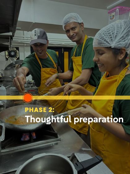 This is Phase 2 of our process: thoughtful preparation. Our happy and focused team works together to cook your meals to perfection.