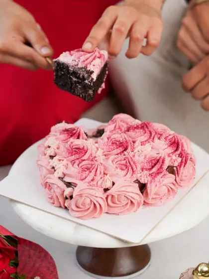 Food is about connection and celebration. For this Valentine's Day shoot, I focused on capturing a sweet, intimate moment, telling a story that makes the product, a beautiful heart-shaped cake, part of a cherished memory.