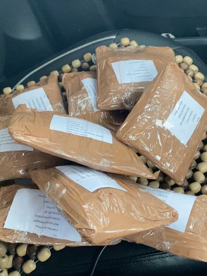 A pile of packages ready to be shipped out. Each one contains my homemade promise of quality and care.