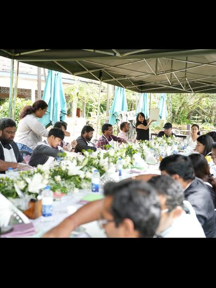 A view of our instructors guiding a large group during an outdoor team building event. We ensure a great experience for every single participant.