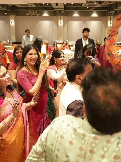 A candid shot of me laughing with the guests during a Mayra function. Even traditional ceremonies can be filled with lightheartedness and joy.