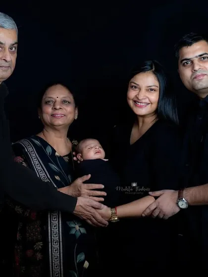 Three generations of love in a single, timeless portrait. Capturing the entire family, from grandparents to the newest little member, is a true privilege.