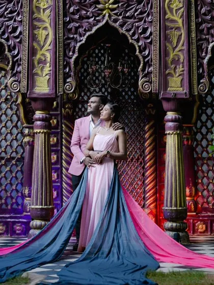 A glamorous shot with a flowing dress against the backdrop of our purple and gold Jaipuri-inspired set.