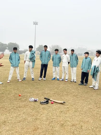 A group huddle before a session begins. This is where we set the tone for the day, focusing on our collective goals and the hard work required to meet them.