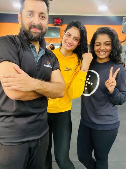 Posing with a couple of my awesome clients.