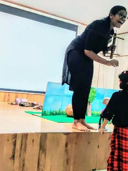 A child from the audience gets to be part of the show. We love including interactive elements in our performances.