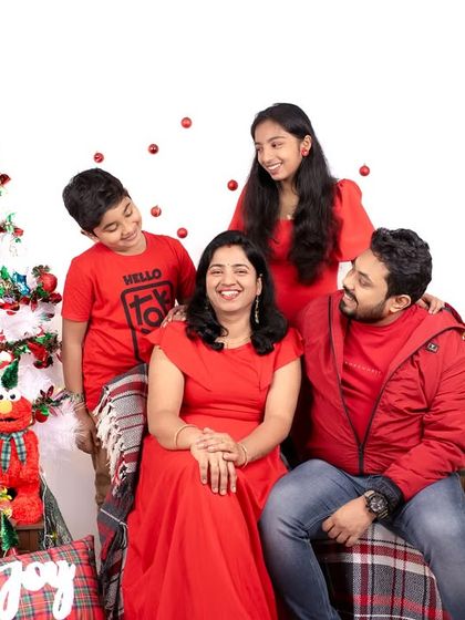 A candid moment from a Christmas family photoshoot. The genuine interactions and laughter between family members are always the best part of the session.