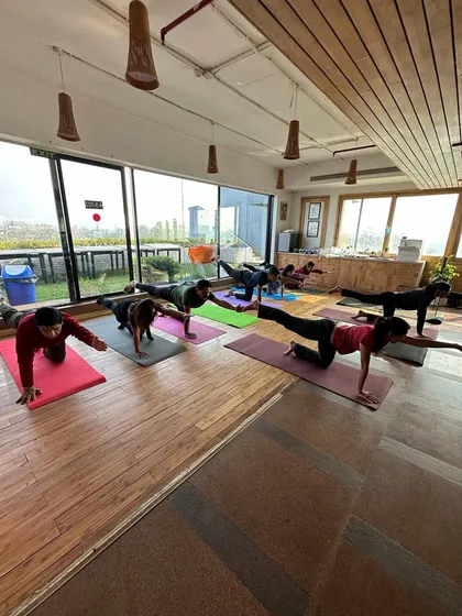 Another view of our corporate yoga session. Bringing yoga into the workplace is a wonderful way to help teams manage stress, improve posture, and build a culture of wellness.