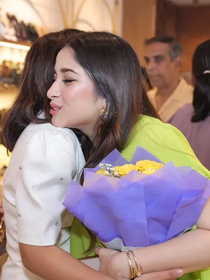 A warm hug with the talented designer at her store launch. Moments like these, celebrating each other's successes, are what build a strong community of female entrepreneurs.