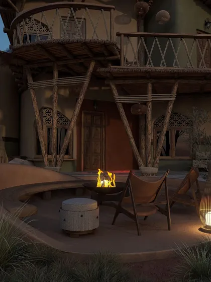 I believe luxury is found in quiet moments. This private patio features a sunken fire pit and comfortable seating, offering a cozy nook for guests to gather under the stars. The design uses curved earth-toned plaster and natural wood to create a feeling of being cradled by the landscape.