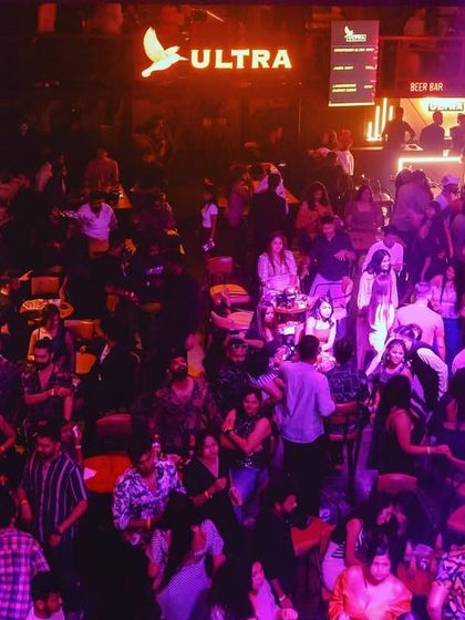 A wide shot of the venue during the Kingfisher Ultra event, showing a full house. My presence helps draw crowds and ensures a successful night for the venue and brand partners.