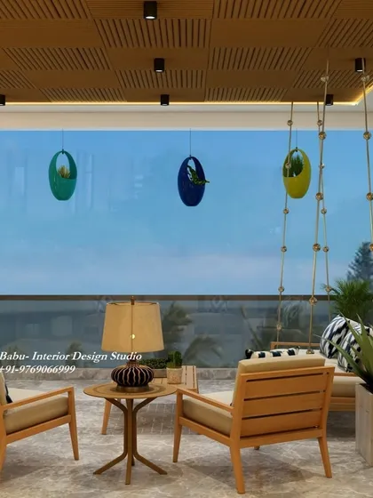 This balcony features a wooden ceiling with spot lights and comfortable wooden armchairs, creating a warm and modern outdoor living space.
