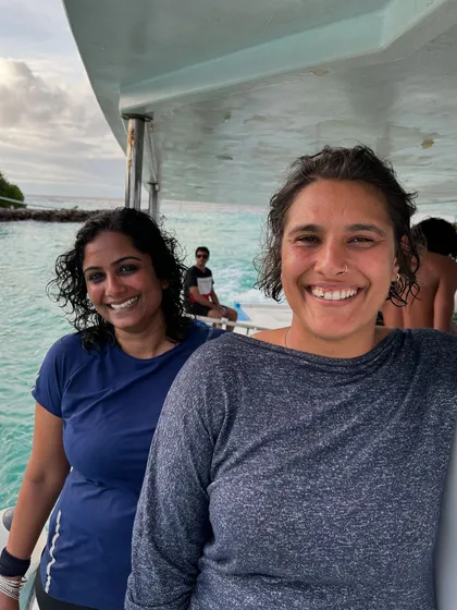 Two friends enjoying the view from the dive boat in the Maldives. These are the quiet moments of connection that make our trips special.