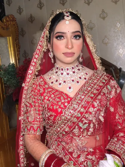 A classic bridal look with soft, glowing skin and perfectly defined features.