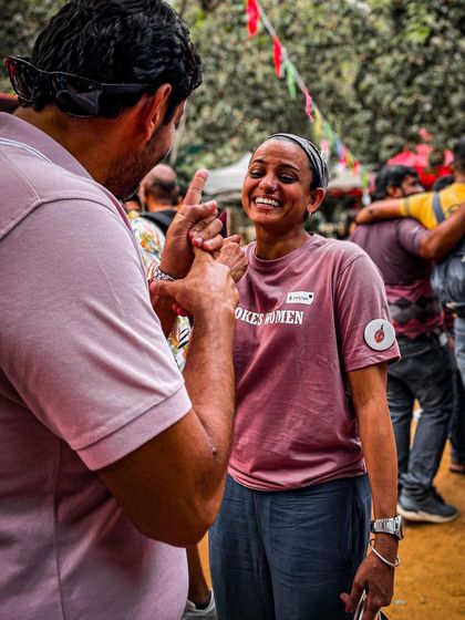 Laughter and good times are guaranteed at our events. A happy moment captured at the SpokesWomen Garage Sale.