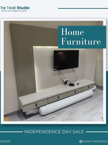 A custom-designed floating TV unit with a fluted back panel and integrated backlighting. The long, low-profile console offers ample drawer storage while maintaining a clean and modern look.