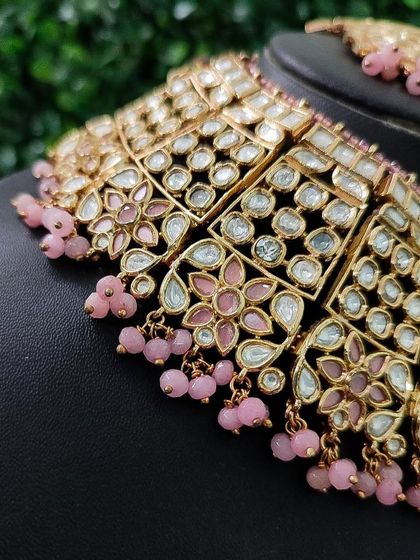 Another detail shot of the beautiful pink floral enamel work on the choker.