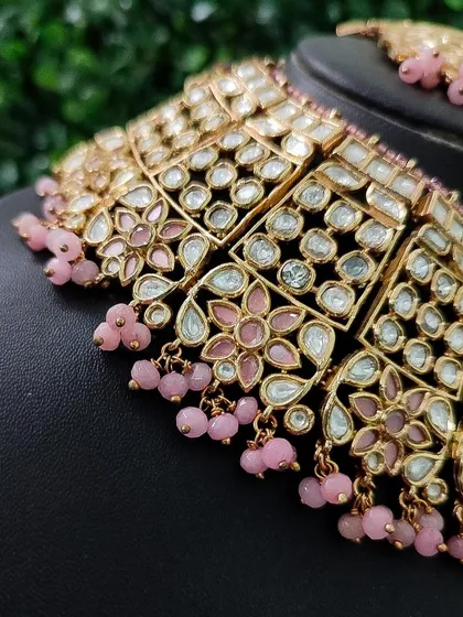 Another detail shot of the beautiful pink floral enamel work on the choker.
