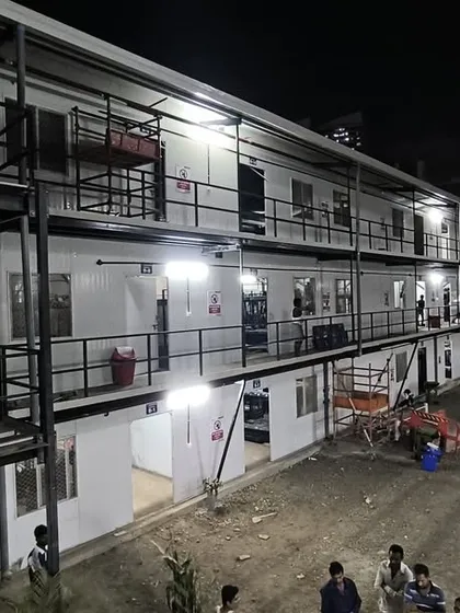 A night view of the completed G+2 prefabricated labor colony for Leighton India in Mumbai. This 22,322 sq. ft. project showcases our ability to deliver quality and efficiency on a large scale.