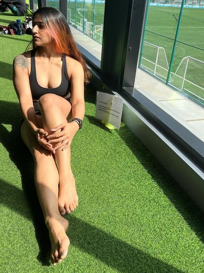 Soaking up the sun by the window at the gym. Taking a moment to rest and reflect between sets.