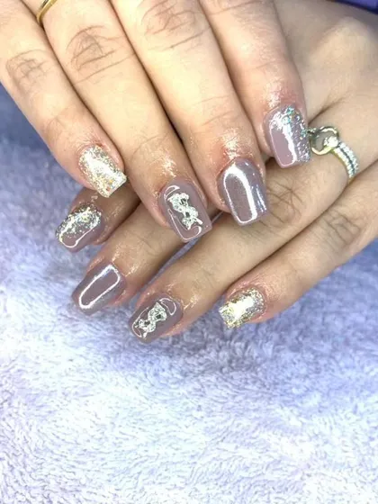 A sophisticated set in a neutral taupe color, with gold glitter and white 3D dragon accents.