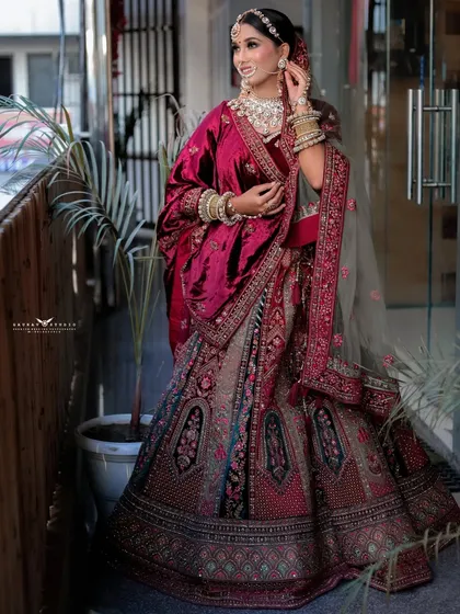 Another full-length shot capturing a candid moment of the bride smiling, adding a touch of natural charm.