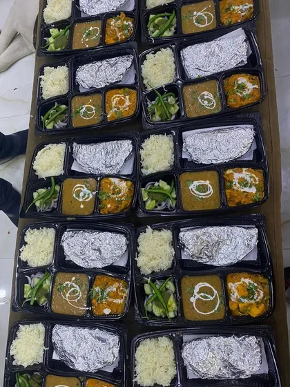 This bulk order is being arranged for dispatch. It's a satisfying sight to see so many meals ready to make an event special.