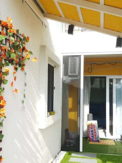 Many people buy a house for its large balcony but are not sure what to do with it. For this home, I created a simple garden space for a mother and her young child to enjoy outdoor activities together.
