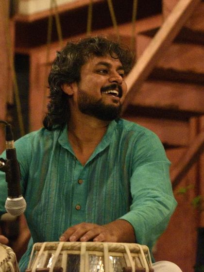 A candid shot of me playing at The Courtyard.