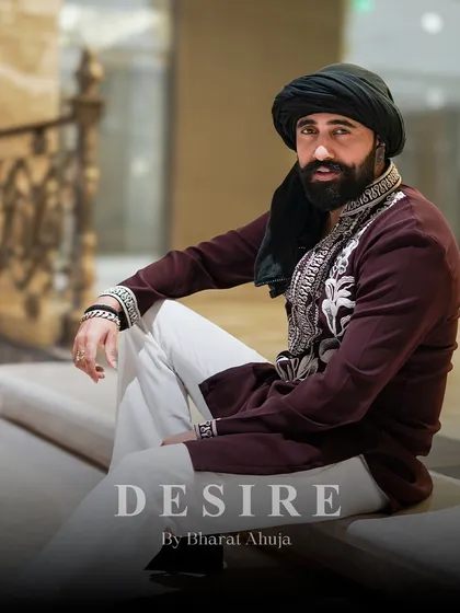Relaxed, yet in command. This image shows how my custom kurtas are designed not just for formal stances, but for moments of ease, without ever sacrificing their luxurious and powerful aesthetic.