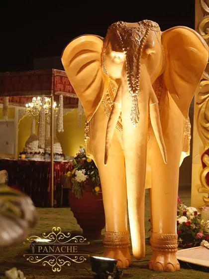 A close-up of the life-sized, intricately detailed elephant prop. These signature pieces are perfect for adding a touch of Indian royalty and creating unforgettable photo opportunities for guests.