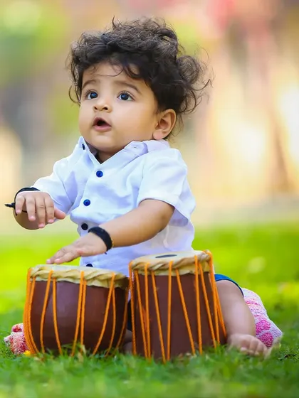 Introducing the next tabla sensation. Using musical instruments as props can be a wonderful way to add a personal and playful touch to your child's portrait session.