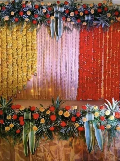 A colorful and traditional backdrop, this design uses curtains of different colored flowers to create a vibrant and multi-textured look.
