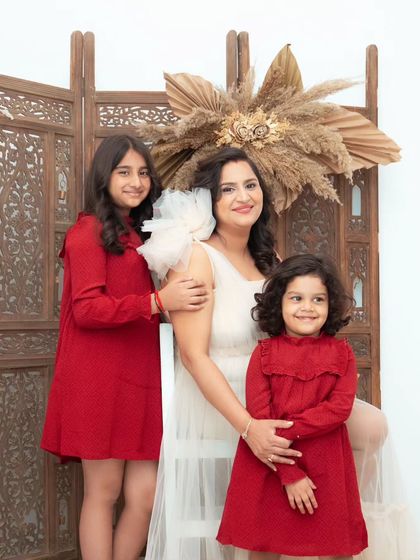 A beautiful portrait of a mother with her two daughters. We love creating elegant and timeless images that celebrate family bonds across all ages.