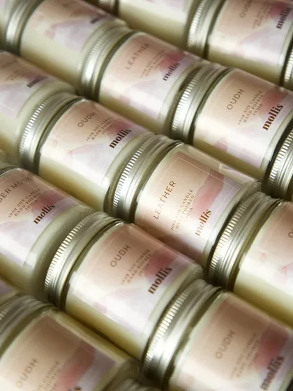 These adorable baby announcement favors, featuring custom-labeled candles, are a perfect way to share the joy.