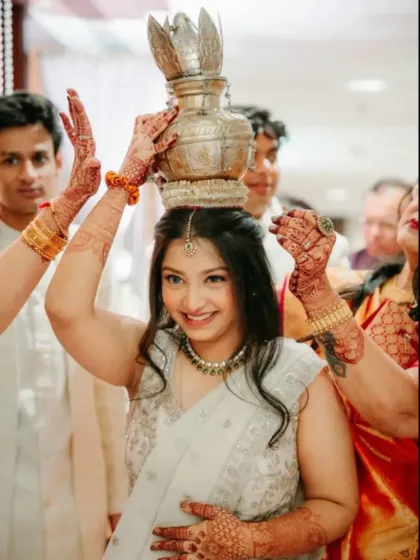 Makeup should look just as beautiful in candid moments as it does in posed portraits. Here, the bride's sister looks radiant and natural during a wedding ceremony, showcasing a soft glam look that enhances her features without feeling heavy.