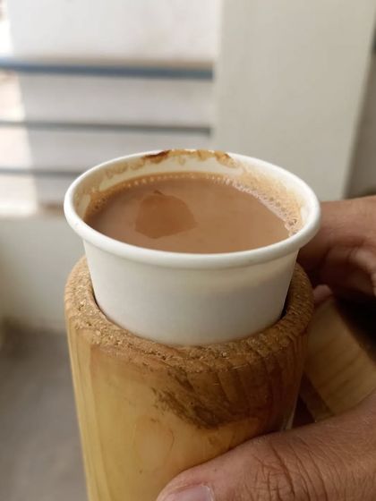 I made this cup holder on my lathe to solve a very real problem: carrying a flimsy paper cup of tea without spilling it. A perfect blend of woodworking and daily life.