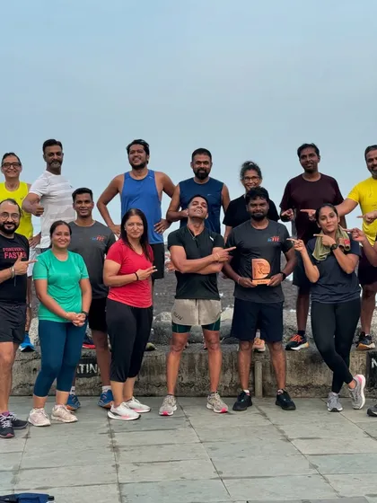The team celebrating a member's achievement. We believe in lifting each other up and recognizing every milestone.