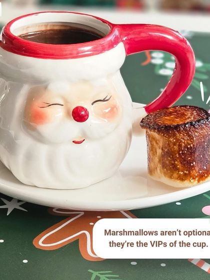 Marshmallows aren't optional, they're the VIPs of the cup. Our hot chocolate, served in a cute Santa mug with a perfectly toasted marshmallow, is a must-have winter treat.