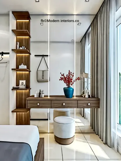 A bright and airy dressing corner designed for a compact bedroom. The floating vanity with drawers, vertical shelving, and a large mirror create a functional space that feels open and light.