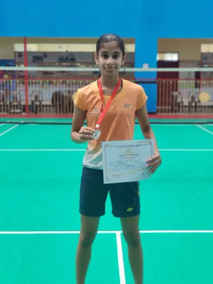Avni Shetty with her silver medal and certificate from the CISE Zone D Championship. She showed great promise in the Girls Singles U14 category.